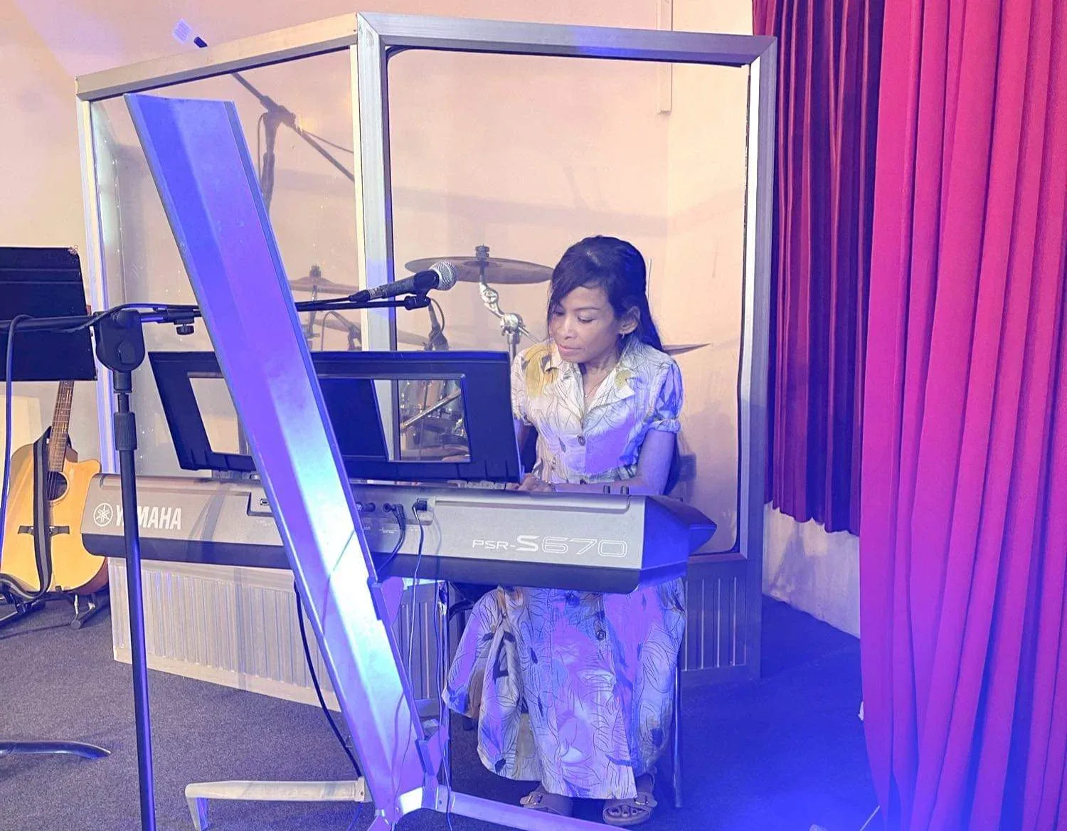 Naleng Real leading worship at Good News of Jesus Church